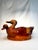 This charming vintage duck-shaped basket, likely dating to the 1970s–1980s, is crafted from tightly woven wicker or...