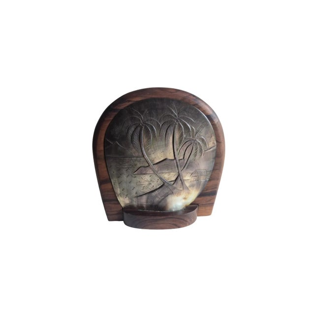 An extraordinary, large hinge-lidded, carved-walnut wood box with a beautiful, hand-carved opalescent shell lid showing a...