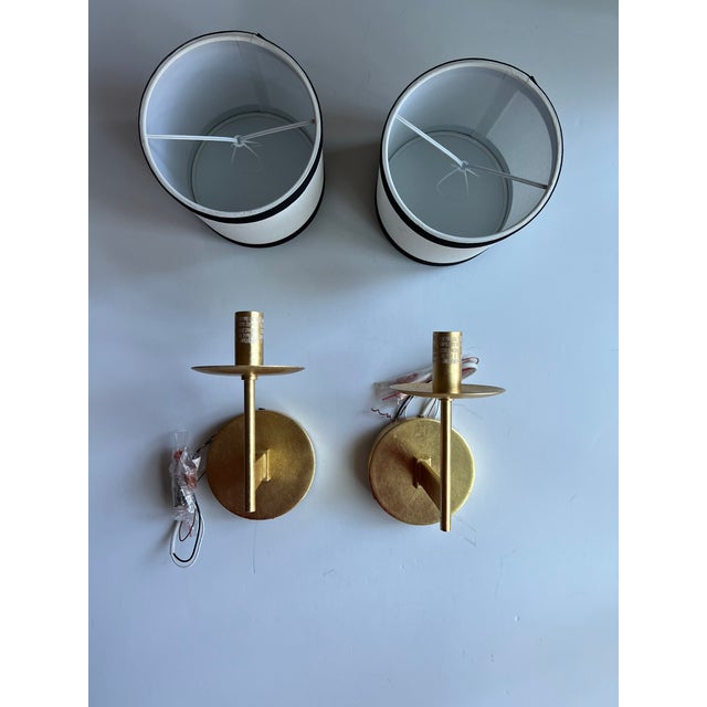 KATE SPADE NEW YORK WALKER SMALL SCONCE IN GILD WITH CREAM LINEN SHADE WITH BLACK LINEN TRIM WALL LIGHTS. Two sconces and...