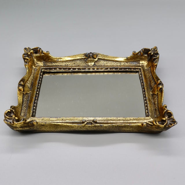 A glamorous vintage mirror/vanity tray by E.A. Riba Co. Inc. of Brooklyn, NY, a mid-century American maker known for...