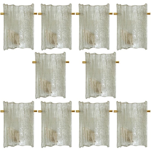 Clean lines to compliment all decors. A wonderful high-end j.t. Kalmar wall light fixture with thick textured blown glass...