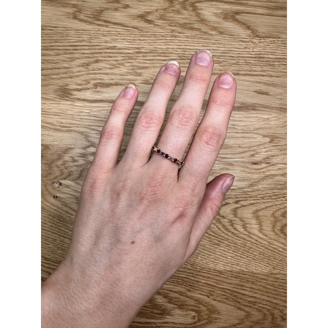 This simple durable band is perfect for wearing by itself or stacking with other rings or bands! Deep, rich, red rubies...