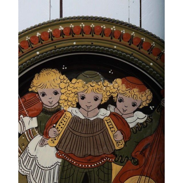 Swiss ceramic wall plate from the mid-20th century by Rudolf Heimberg. Handmade at the Kohler Biel Pottery factory in...