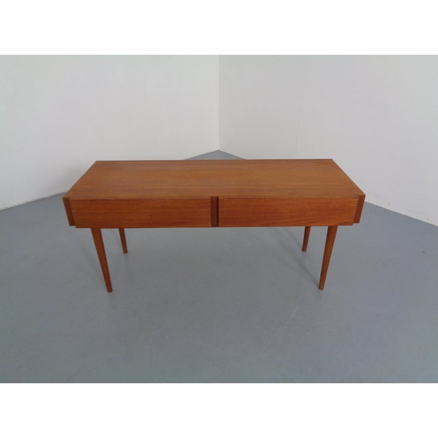 Small, Danish lowboard with 2 drawers from the 1960s in teak.