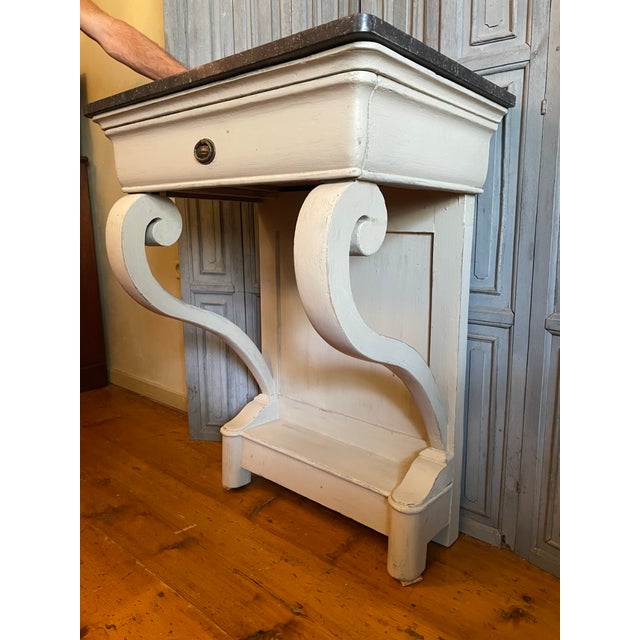 A magnificent 19th-century wall console from France, Louis Philippe period. This is actually a very beautiful table model...