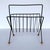 An iconic magazine rack in great vintage condition! Lends your home a classic air of mid century modernism while keeping...