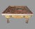 This antique Chinese coffee table is a stunning piece of furniture that showcases intricate carving and a unique design....
