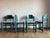 Unusual Hank Lowenstein green Padova chairs with striated woven rush seats, set of four, unsigned. Wide set, grounded and...