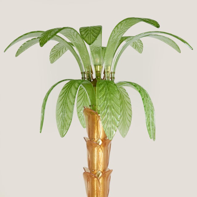 Chic mid century Italian floor lamp in a modern stylized palm tree form crafted with dramatic hand blown palm fronds and...