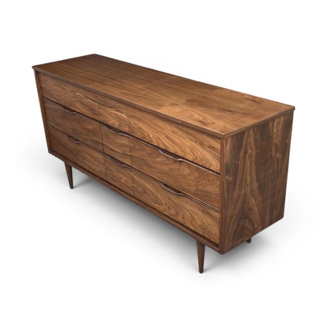 Designed to be both striking and functional, this fully restored walnut dresser brings warmth, sophistication, and...