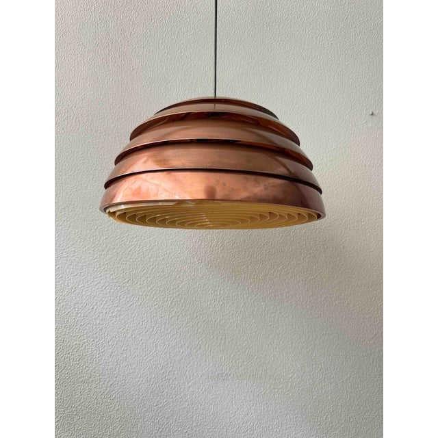 This elegant pendant lamp, model t325/450, was designed by hans-agne jakobsson and produced by his own company in...