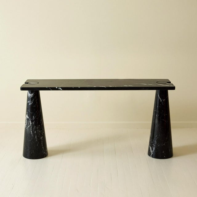Designed by Italian architect and designer Angelo Mangiarotti in the 1970's, this console table part of a larger "Eros"...
