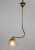 A simple, brass stem in an "L" shape - with the light pointing down. Perfect for a corner. The empire shaped, hand-blown...
