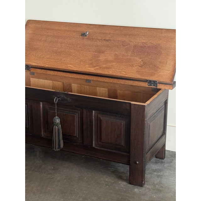 Solid oak in a dark stain, early antique English coffer meant for storing blankets. Has its original key with fringe...