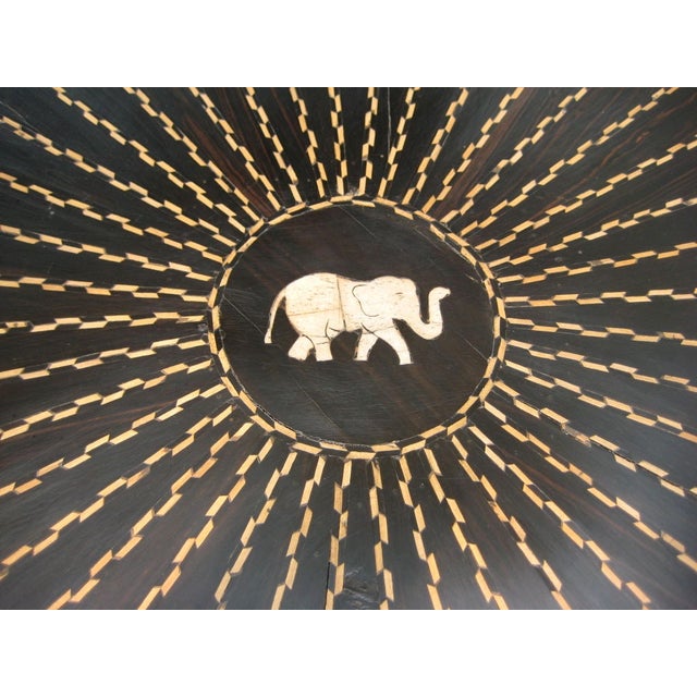 A gorgeous, ebony Anglo Indian center table from the 19th Century.