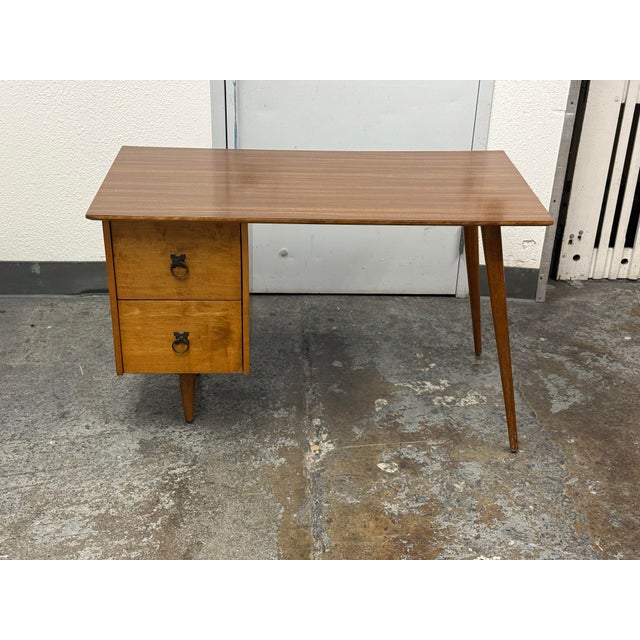 Design Plus Gallery presents a Mid 20th Century Planner Group Desk by Paul McCobb for Winchendon Furniture. This 1950s...