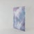 This serene modern art piece captures a sense of ethereal movement through a soft, atmospheric blend of lavender, slate...