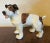 Pottery dog sculpture of a Jack Russell terrier. Beautifully captures the essence of this breed. Measures 7" x 3" x 5 3/8"...