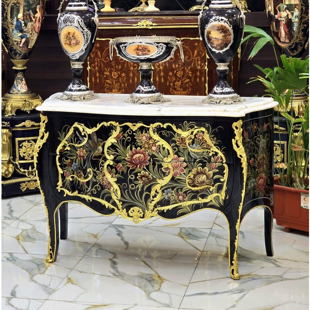 A true work of art, this French Louis XV Bombe Chest blends exceptional craftsmanship with timeless elegance. Featuring a...