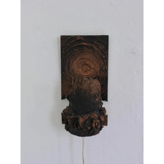 Brutalist ceramic/metal wall sconce by Finnish artist Jouko Kytömaa, made in the 1970s. The sculptural form features...