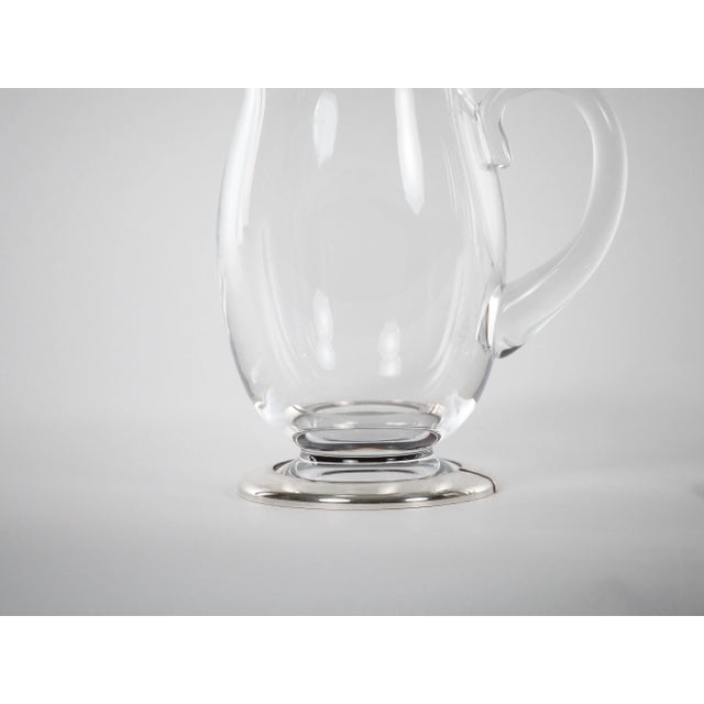 Hand Crafted pair baccarat crystal with silver plate base tableware / barware serving pitcher. Each pitcher features a...