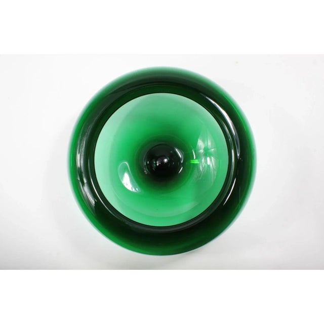 Large emerald colored hand-blown bowl by Per Lutken for Holmegaard. Unsigned