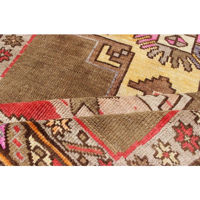 Vintage Turkish Kars Runner With Brown, Red, Yellow, and Soft Pink Tones For Sale - Image 12 of 13