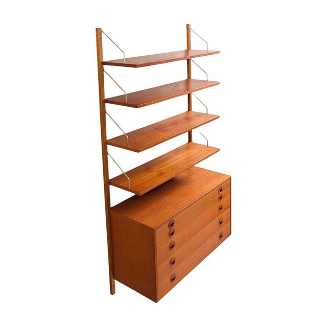 Beautiful "Royal System" wall shelf by Poul Cadovius from the 1960s for sale. The shelf system consists of two wall rails,...