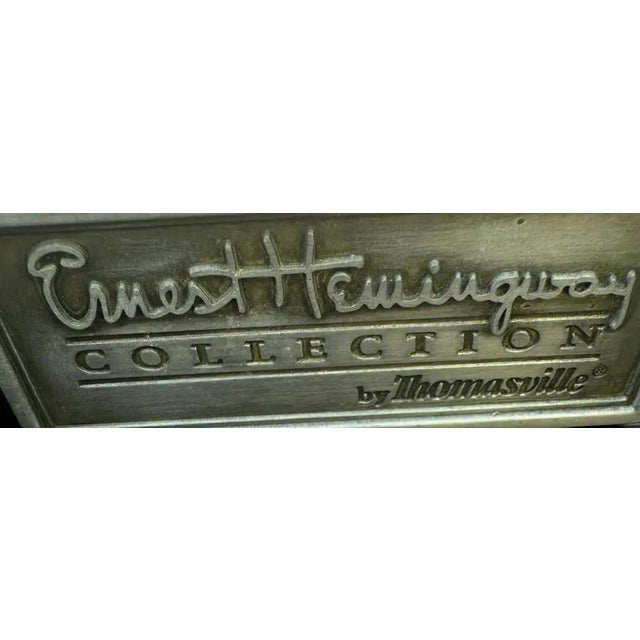 Thomasville Ernest Hemingway Kilimanjaro Collection . A warm, texture-rich rattan and bamboo cabinet with a sleek black...