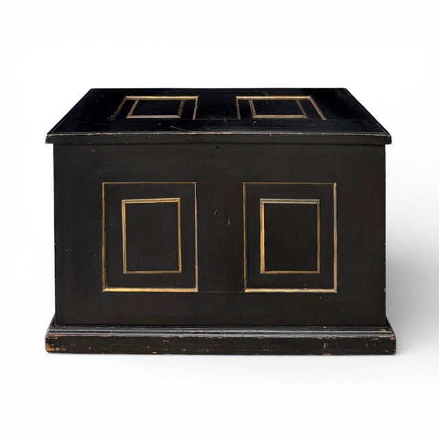 A late 19th century paneled blanket chest constructed of cedar with pine raised panels at the top and each side, and...