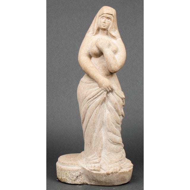 J. Todak (XX) Standing Nude Woman Carved Stone Sculpture, modeled as a woman captured in a moment of contemplation,...