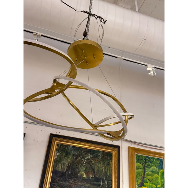 Design Plus Gallery presents The Orbit Chandelier from Michael Oren Designs, inspired by the On It Goes by Niamh Barry’s....
