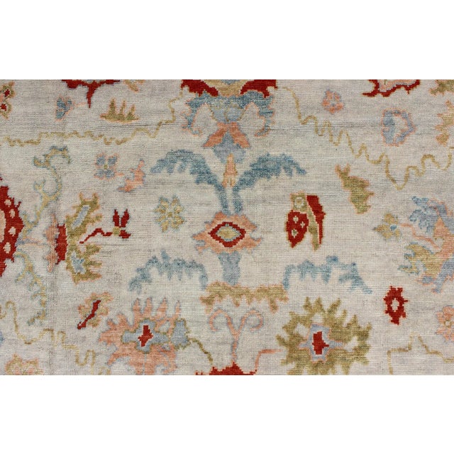Cream Large Angora Oushak Turkish Rug With All Over Design in Light Blue, Ivory & Red For Sale - Image 8 of 13