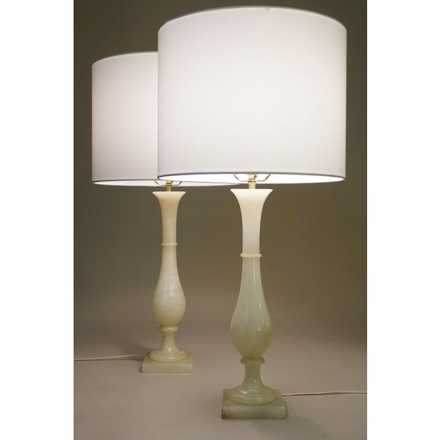 A striking matching pair of New-Old-Stock unused Italian Alabaster marble Classic Hollywood Regency Urn style "Teardrop"...