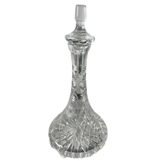 Neoclassical style European Cut Crystal Decanter with Faceted Stopper This elegant cut crystal decanter features a...