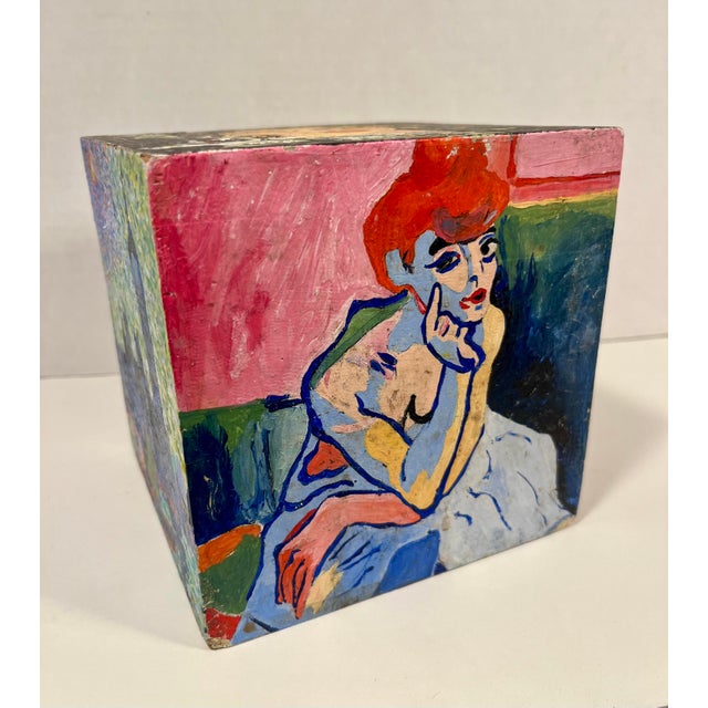 This captivating hand-painted wooden cube is a tribute to the iconic French artist André Derain, with each side inspired...