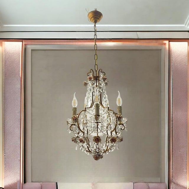 Crystal chandelier from the 1960s with ceramic handmade roses. brass frame with hanging crystals and ceramic roses. height...