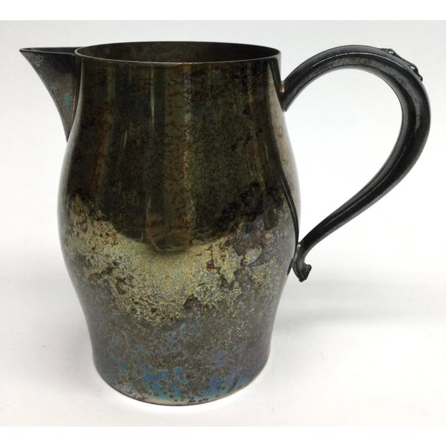 Pictures tell the story of this gorgeous vintage vase, pitcher, teapot, or even a brush pot. Or even in your kitchen for...