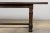 A substantial antique French refectory dining table in the Louis XIII style, sourced in Provence, France. Crafted in solid...