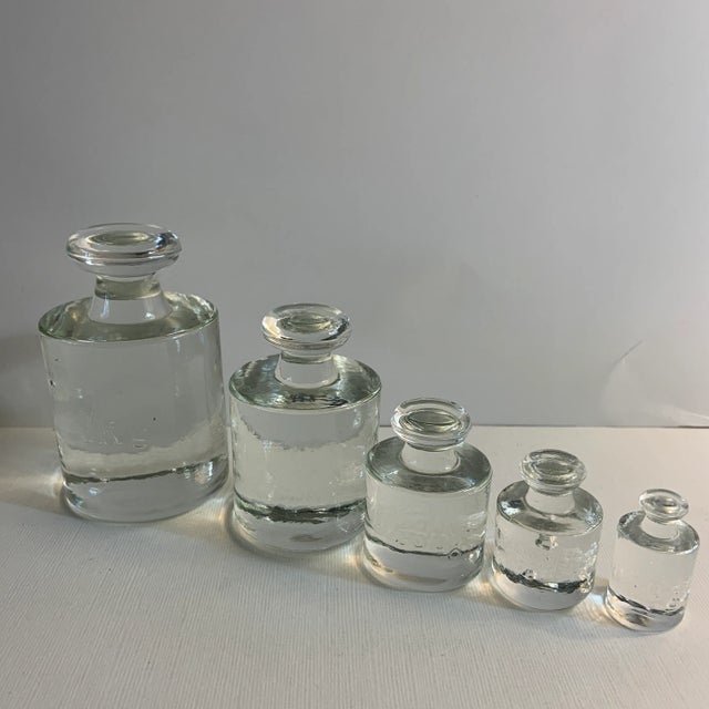 Wonderful vintage glass metric calibration set. To catch light in your windows or for table top display. Unusual decor item!