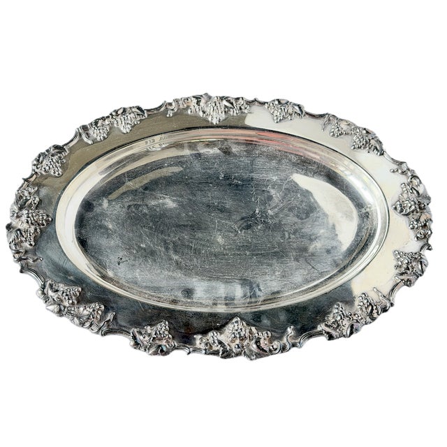 Vintage English silverplate grape and vine oval shaped serving platter with grape and vine frieze surround decoration in...