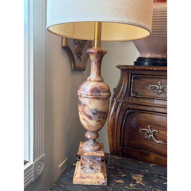 Elegant vintage Italian table lamp Circa 1960 crafted from richly veined honeyed onyx in a classic urn form. Original...
