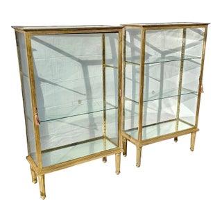 Pair of Antique Early 20th Century French Double-Sided Solid Brass and Glass Display Cabinets For Sale