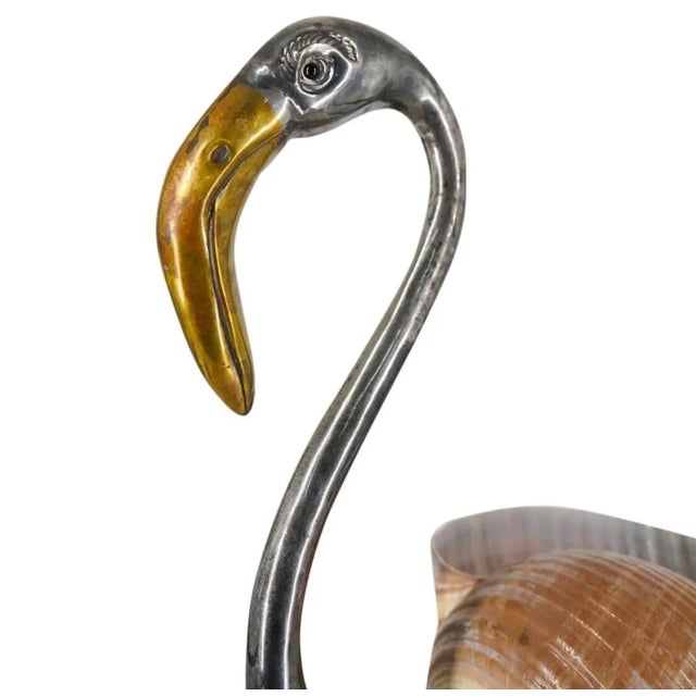 Just in this beautiful large Italian Flamingo in Silver Plate, Brass with a Large Seashell. This figurine sculpture is by...