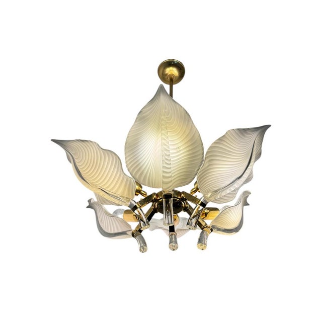 Splendid Hollywood Regency chandelier by Franco Luce, Italy, 1970s. Gold-plated metal base with six adjustable arms, each...