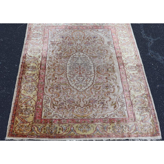 Measures: 3'0 x 3'9 Antique Turkish Silk Hereke Rug with Floral Medallion Design and Ivory Field. Keivan Woven Arts /...
