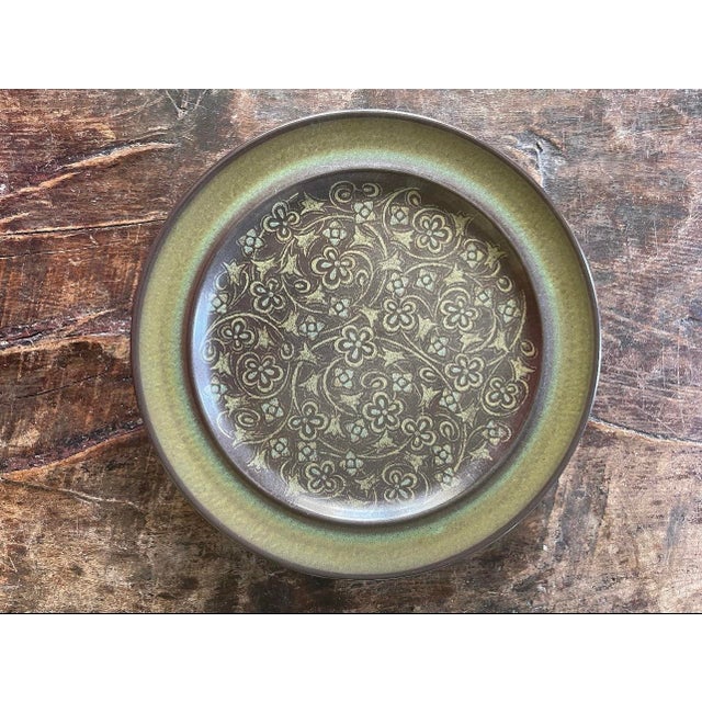 Charming set of four plates by Franciscan in the Madeira pattern, presented in a deep chocolate brown with a pattern and...