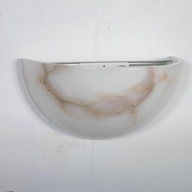 Single Art Deco inspired Spanish alabaster sconce. Each piece displays naturally occurring variations in color and veining.