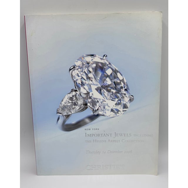 Step back in time with this exquisite Christie's auction catalog, featuring the prestigious Important Jewels sale,...