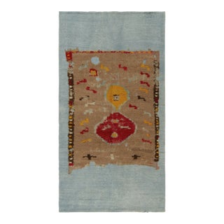Distressed Brown Rug Fragment on Blue Flat Weave by Rug & Kilim For Sale